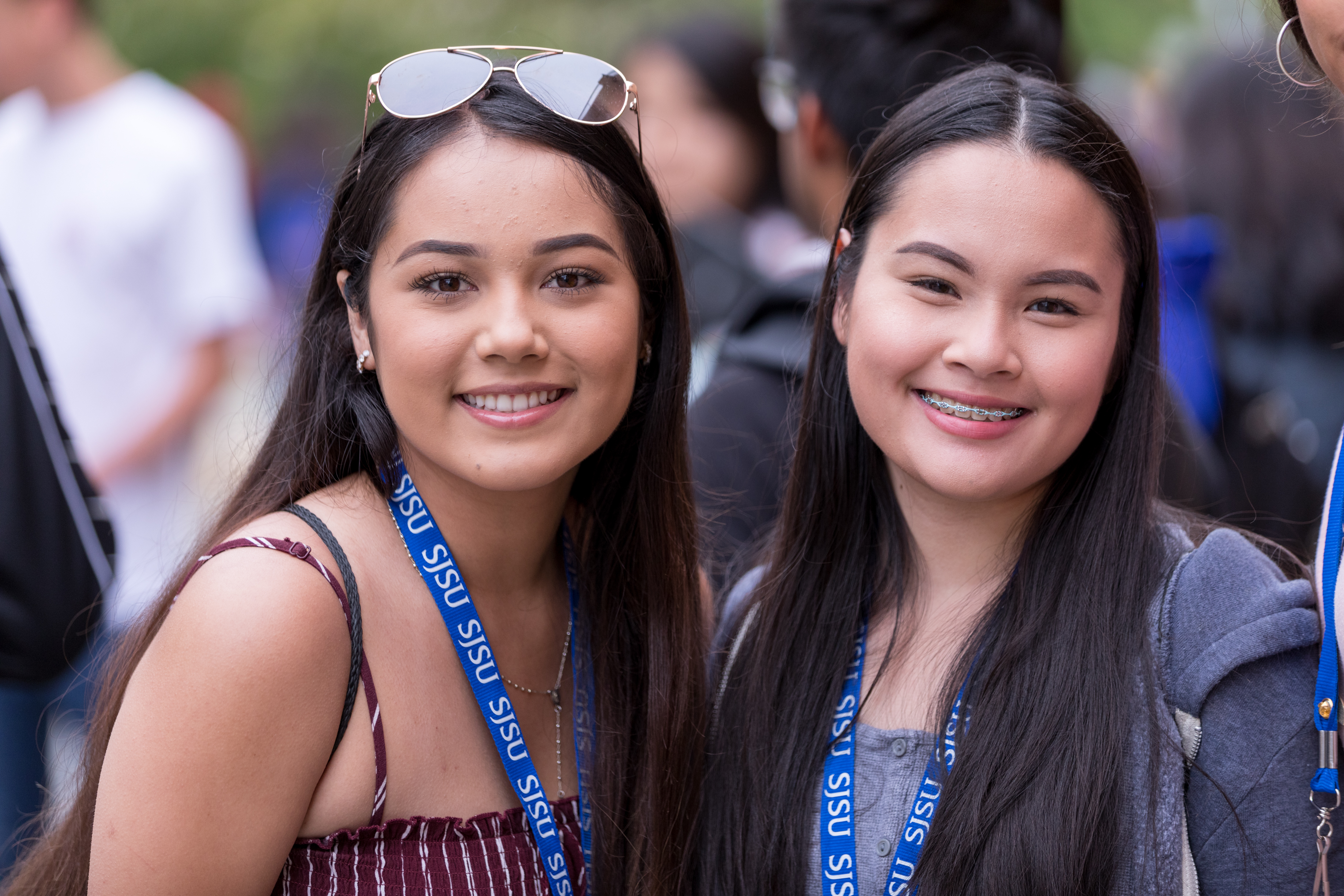 Two students smiling during orientation