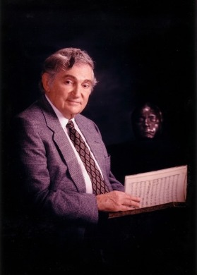 Portrait of Ira F. Brilliant holding a book