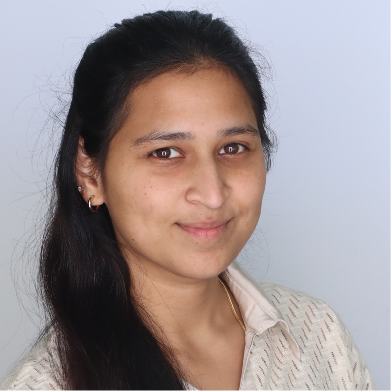 aruna headshot smiling