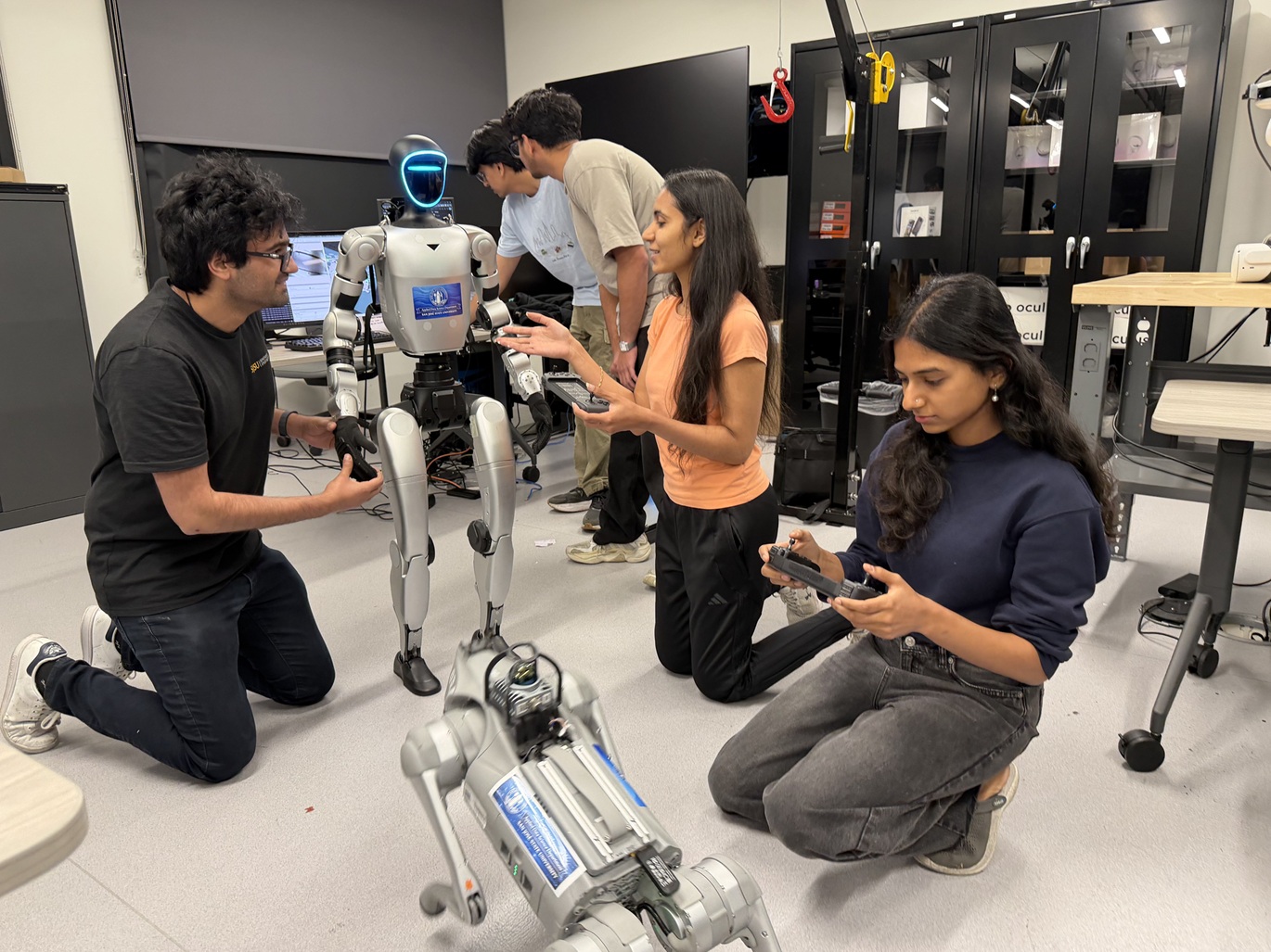 students building a robot photo of students building robot