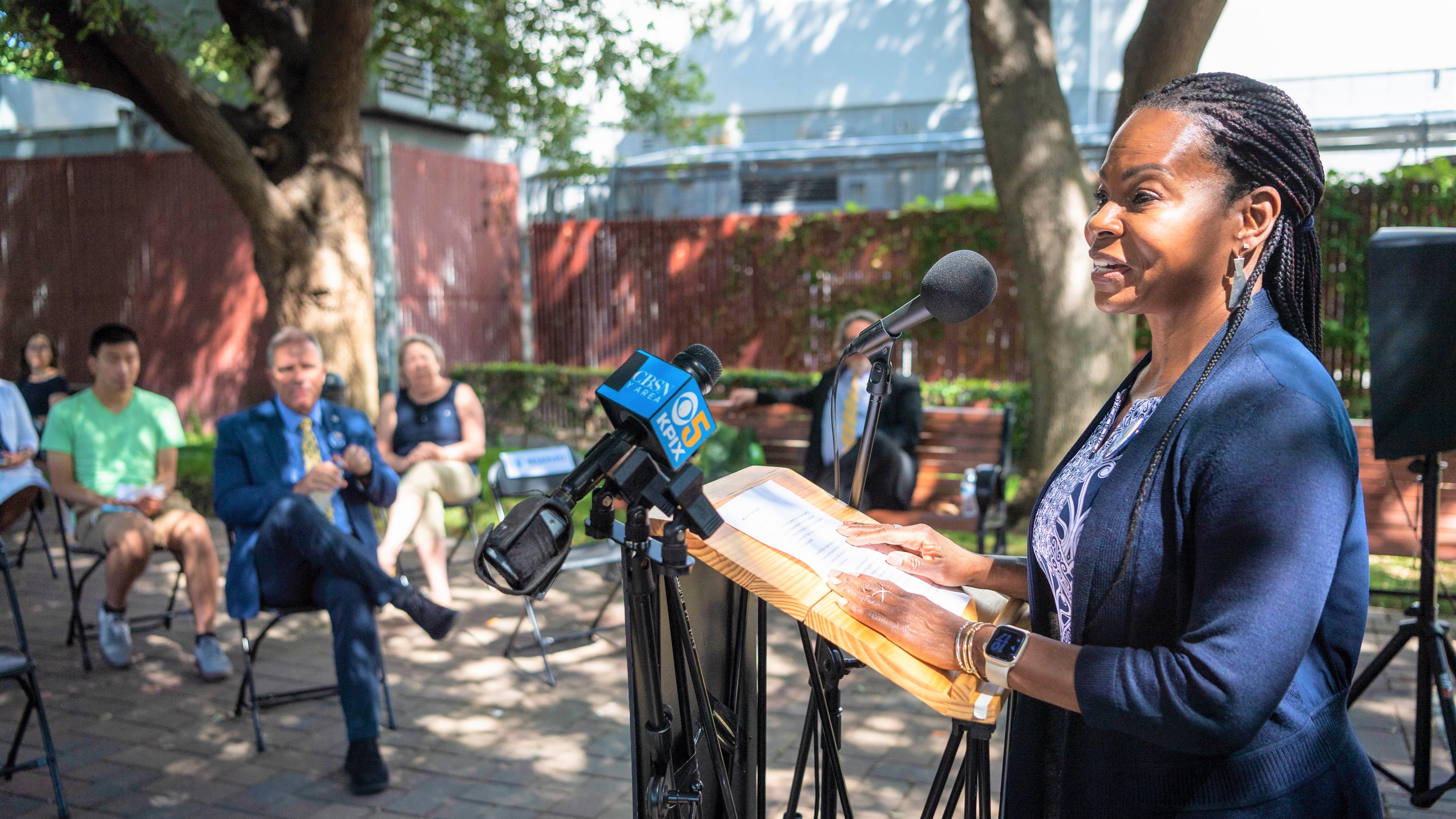 An SJSU employee speaking to the media at a press conference