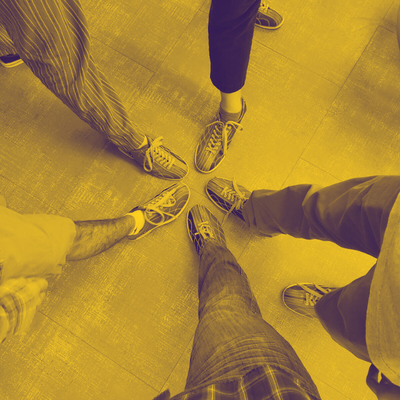 Team wearing bowling shoes pointed towards center